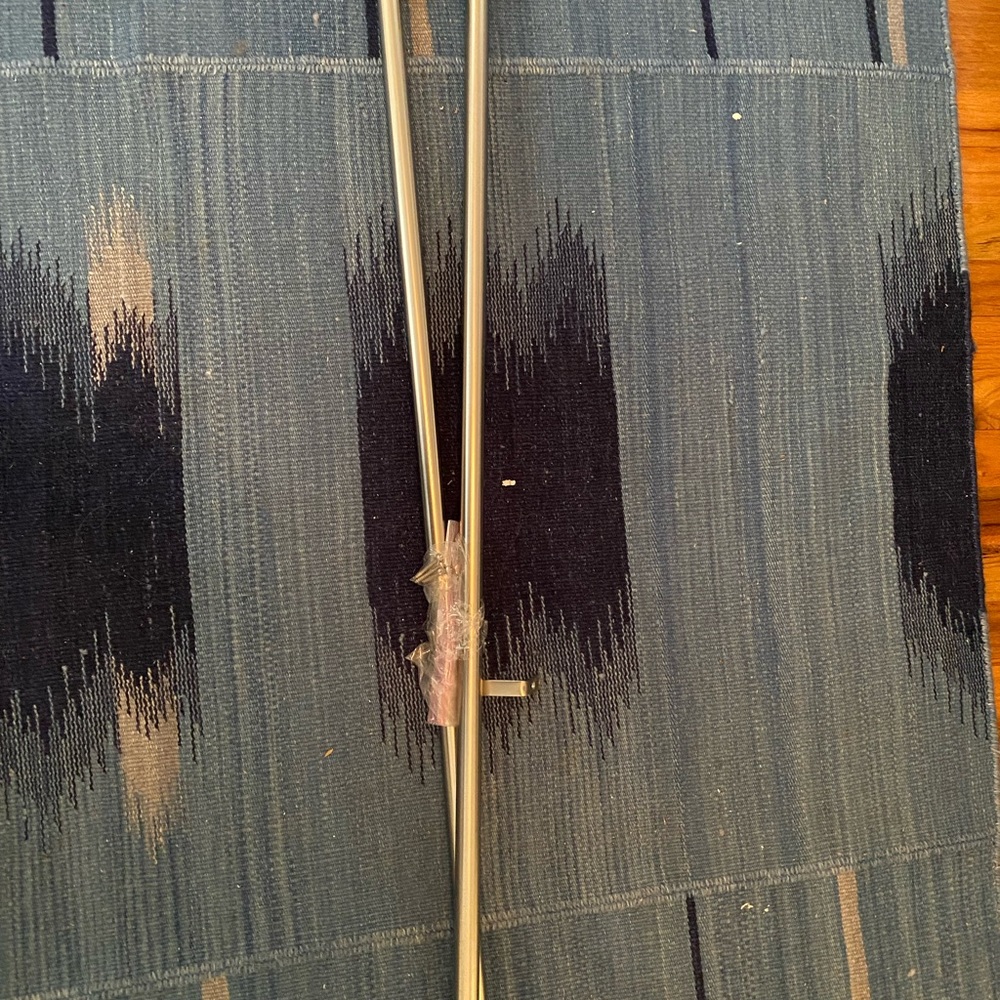 Silver Curtain Rod with Parts Extendable up to 48”